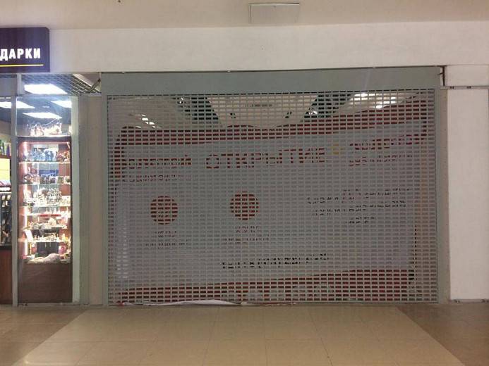 Роллетные решетки в торговом центре Роллетные решетки в торговом центре